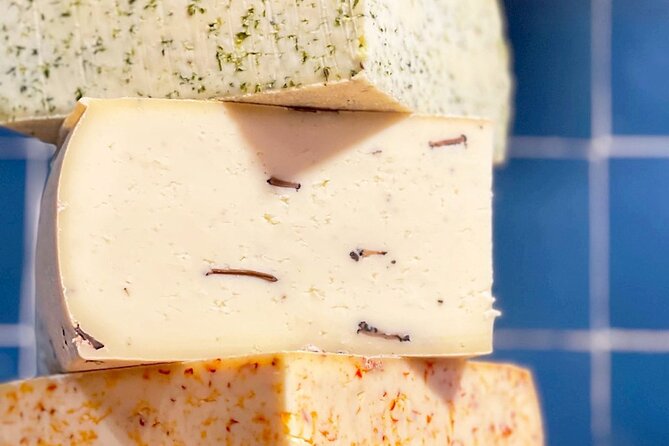 10+ tastings Gourmet Food & Wine Tour in the Heart of Paris - Ô Chateau wine bar: cheese, charcuterie, terroir talk, and a café-style surprise