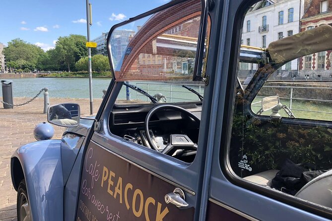30-Minutes Private Guided Tour of Lille by Convertible 2CV - The Belfry and the 13th-century hospice museum: two very different kinds of heritage
