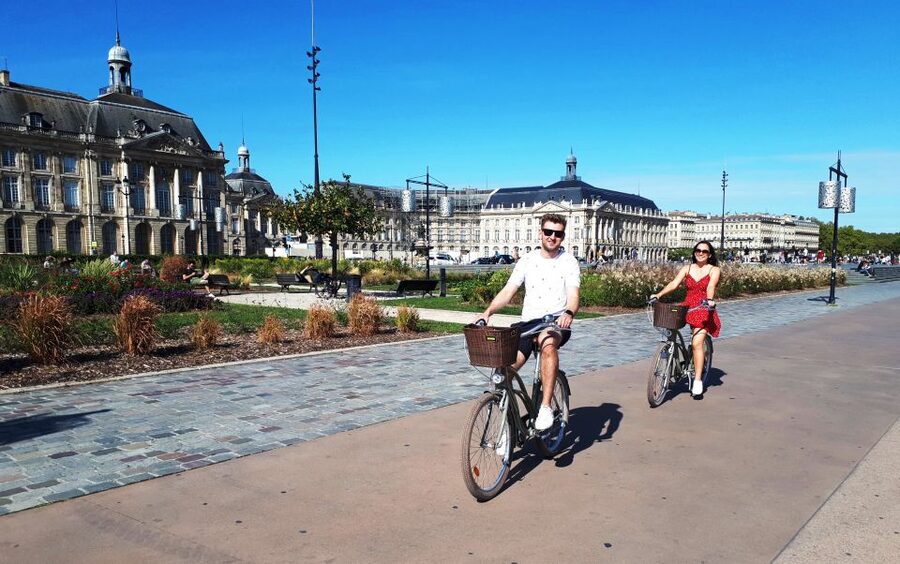 Bordeaux: Top Landmarks & Historic Bike Tour - Pont de Pierre and the Port of the Moon views you will remember
