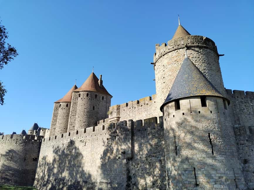 Carcassonne: Private Guided Tour of the Medieval Fortress - Inside the 2-hour Cité walk: walls, streets, and battle logic