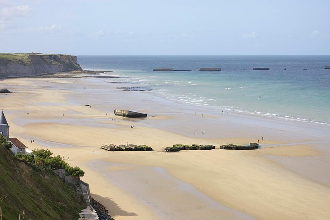 DDay Beaches Private Tour in Normandy from your Hotel in Paris - Pointe du Hoc: The 90-Foot Cliffs and the WWII Bunker Remnants