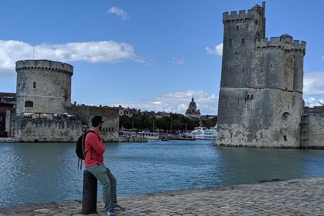 Discover La Rochelle: Discovery Walking Tour of La Rochelle - Porte de la Grosse-Horloge and what old city walls really mean