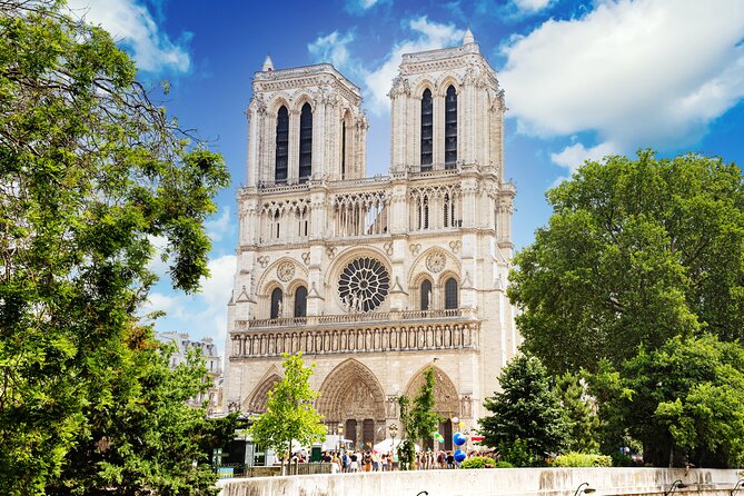Early Access Paris Notre Dame Cathedral Walking Tour - Square Jean XXIII, flying buttresses, and the Roman layer of Paris