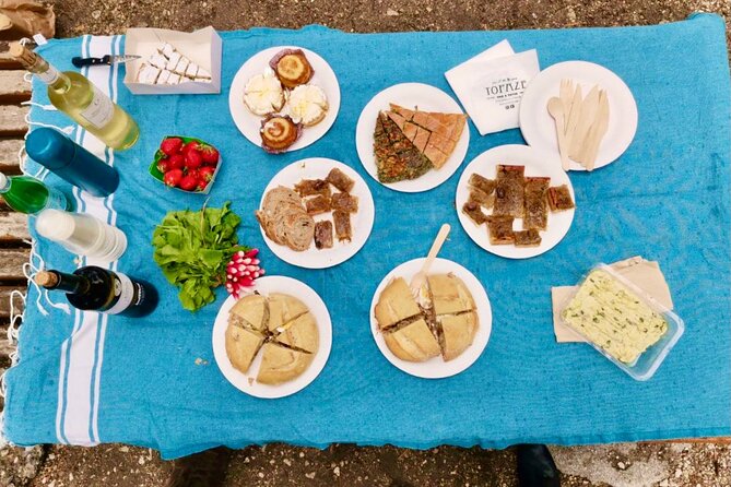 Food & Wine Lovers Tour of Nice Local Markets and Best Shops - Stop 1 at Castel Plage: a quick intro by the sea