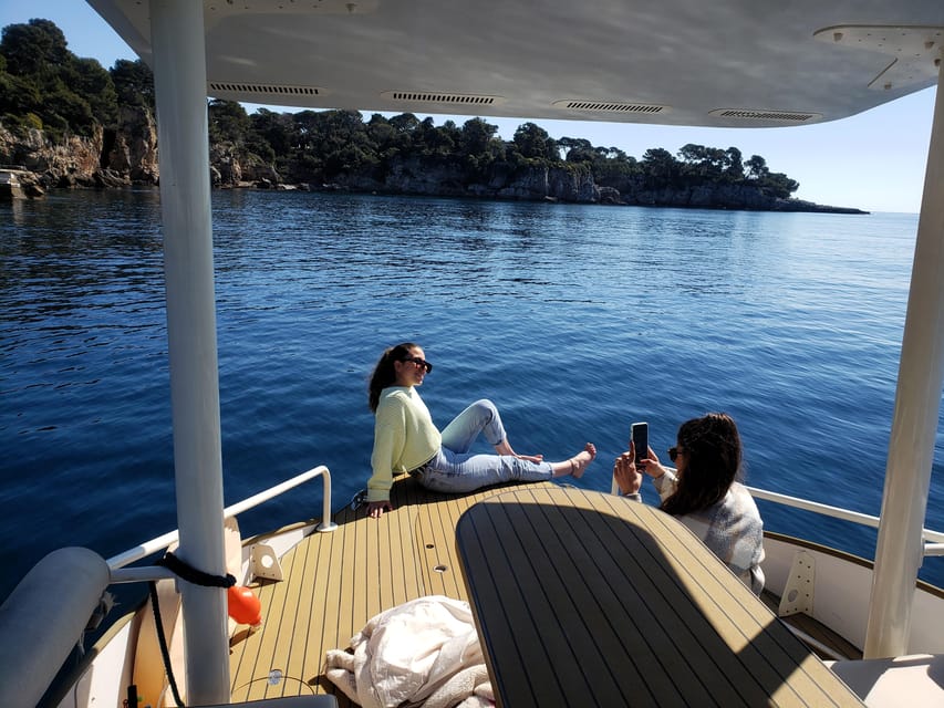 From Juan les Pins: Private French Riviera Solar Boat Cruise - Cape d’Antibes, yachts, and the Hotel du Cap-Eden Roc from the water