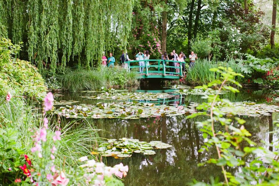 From Paris: Monet Garden & Giverny Bike Tour and Picnic Stop - Vernon market stop and a picnic on the River Seine
