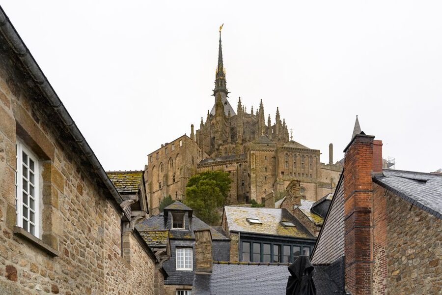 From Paris: Mont Saint Michel Day Trip with a Guide - The coach ride to Normandy, what you gain besides transportation