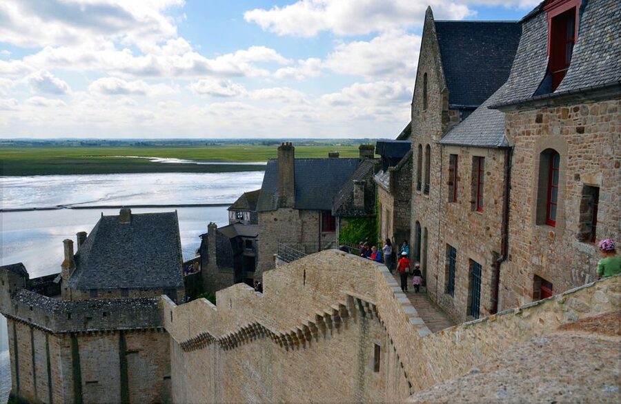 From Paris: Small-Group Mont St Michel Tour & Cider Tasting - Entering the Abbaye du Mont Saint-Michel with an audio guide