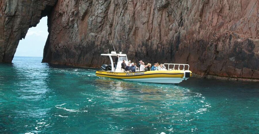 From Porto: Calanche de Piana and Capo Rosso Boat Tour - On board the 12-seater: safety briefing, life jackets, and the guide vibe