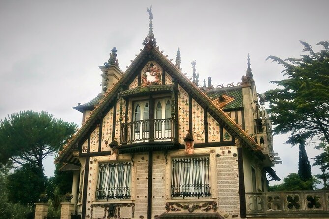 Guided Tour in an Old Convertible Car on the Côte de Nacre - Lion-sur-Mer: town hall streets and a castle frontage moment
