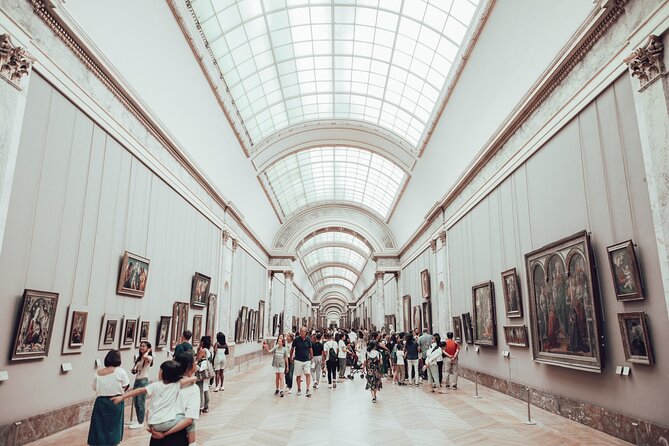 Guided tour of the Louvre Museum with tickets included - Greek department stops: Athena, Venus de Milo, and Victory
