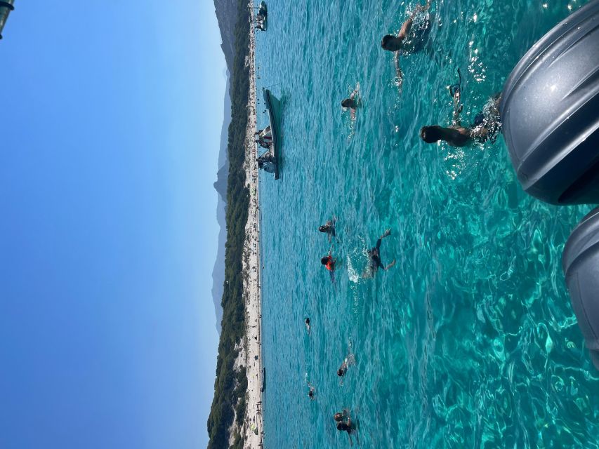 Ile Rousse: desert of the agriates : Saleccia - Ghignu - Saleccia: long white sand, desert rocks, and Cap Corse in the distance