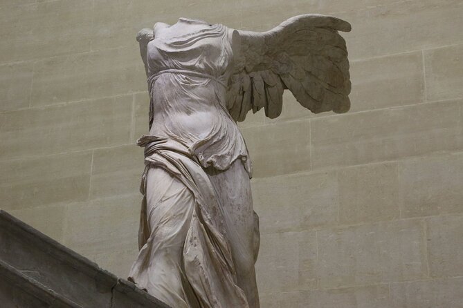 Louvre Museum Access Guided Tour with Mona Lisa - Mona Lisa, Her Smile Debate, and How the Guide Makes Her Make Sense