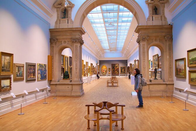 Louvre Skip The Line Guided Tour - Group size and headset reality inside crowded rooms