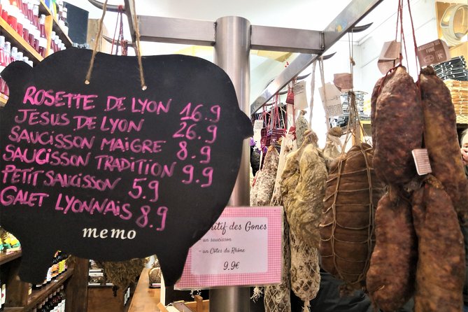 Lyon Old Town Food & Wine Tasting Tour including a Bouchon Lyonnais - What you taste: pralines, charcuterie, pastries, and wine