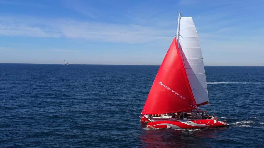 Marseille : Calanques Catamaran Cruise with Lunch & Wine - Calanques National Park swimming and snorkeling, with wetsuits when needed