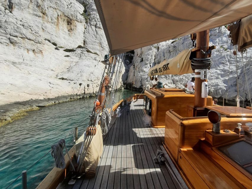 Marseille: Calanques Sailing Day Trip with Lunch and Wine - Swimming and snorkeling in the Calanques coves