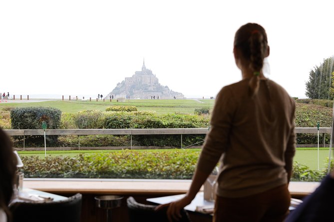 Mont Saint Michel Day Trip with Abbey Entrance from Paris - Fortifications and the return walk: shops, observation points, and timing pressure