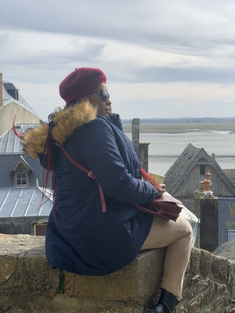 Mont Saint Michel: Walking Tour & Optional Abbey Ticket - Saint-Pierre church and the silver Saint-Michel statue moment