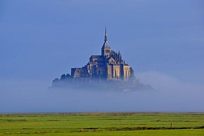 Mont St Michel Full Day Tour with a National Guide from Bayeux - Village first: the medieval streets before the abbey climb