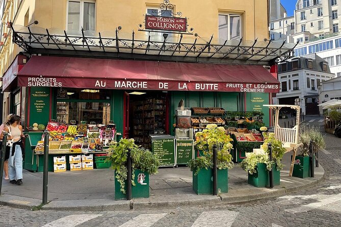 Montmartre Hill French Gourmet Food and Wine Tasting Walking Tour - Mur des Je t’aime and Place du Tertre, where food and art share the same street