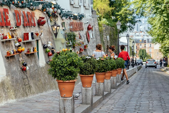 Montmartre Private Food Walking Tour With Locals: The 10 Tastings - Stop 2: Montmartre classics, including quiche Lorraine and crêpes