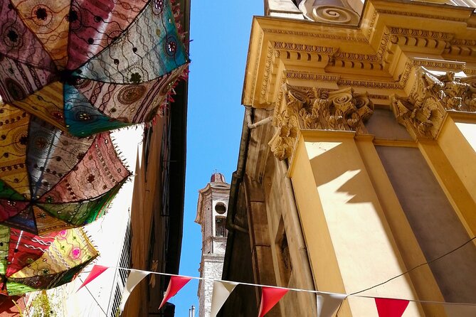 Nice Small-Group Old Town & Castle Hill Cultural Walking Tour with a Local Guide - Garibaldi Square: the painted façade and the Turin connection