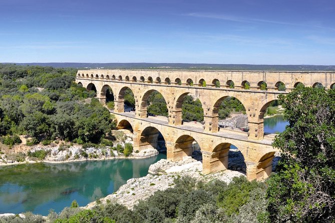 Nimes, Uzes & Pont du Gard Small Group FULL DAY Tour from Avignon - Arenes de Nîmes: The Amphitheater With a Fortress Past