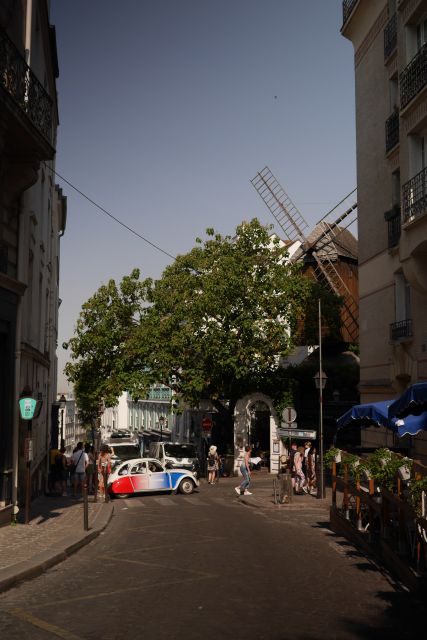 Off-the-Beaten Track in Paris: 2-Hour Vintage 2CV Tour - Institut du Monde Arabe and Place Dauphine: modern design meets old settings