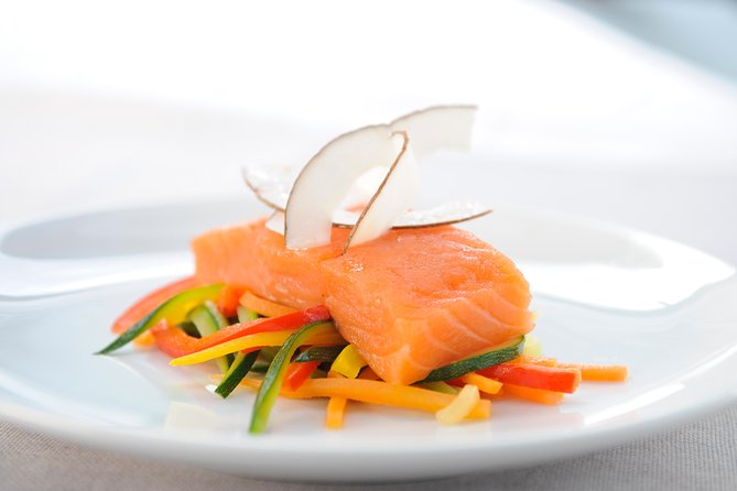 Paris 3-Course Gourmet Dinner and Sightseeing Seine River Cruise - Live singer, onboard photographer, and the extras that cost money