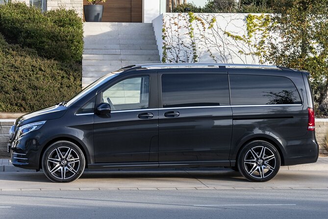 Paris Airport Transfer: Paris Airport CDG to Paris by Luxury Van - The Vehicle Setup: Mercedes EQV or Class V, Sanitized and Back-Seat Only