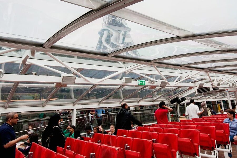 Paris: Audio-Guided Bus Tour & Seine River Cruise - The Seine cruise on a glass trimaran: why the river feels like a different Paris