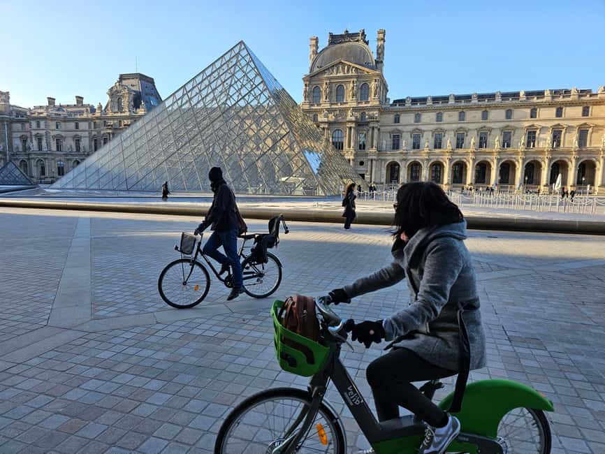 Paris Before the Crowds: Sunrise Bike Tour with Breakfast - Notre Dame Silhouette From the Streets, Not the Crowd