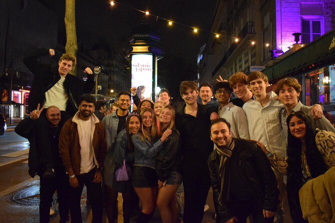 Paris: City Center Guided Pub Crawl with Shots & Club Entry - The Porte-Saint-Denis photo stop: a quick Paris moment without slowing down