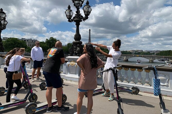 Paris City Tour by E-Scooter with Fun Guide (Small groups) - Invalides to Place de la Concorde: Revolutions, Squares, and Rivers