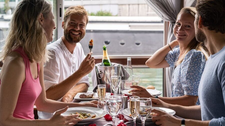Paris: Early Evening Dinner Cruise on the River Seine - Window Views, Live Singer, and the Onboard Atmosphere