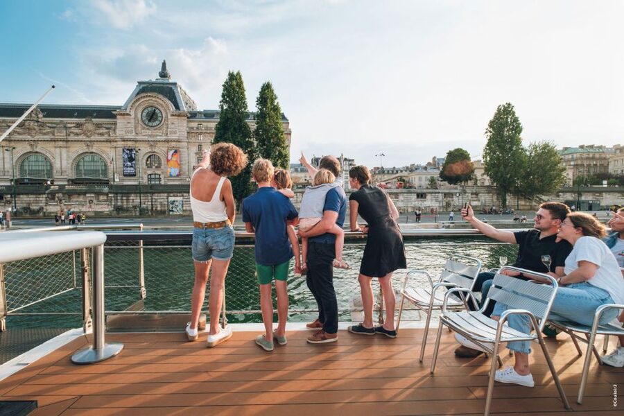Paris: Family-Friendly River Seine Guided Cruise - On-board comfort: toilets, seating, and the bar that helps