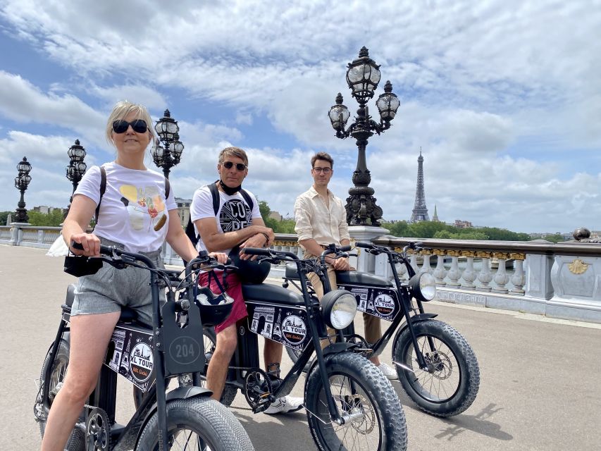 Paris: Guided City Tour by Electric Bike - Pont des Arts, Conciergerie, and Sainte-Chapelle glass and stone