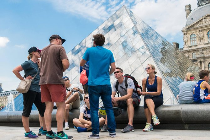 Paris Highlights Bike Tour: Eiffel Tower, Louvre and Notre-Dame - Notre-Dame de Paris: Gothic Details From the Streets