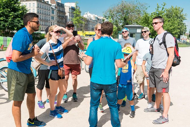 Paris Highlights Bike Tour: Eiffel Tower, Louvre and Notre-Dame - Eiffel Tower Stop: Photos First, Tickets on Your Time