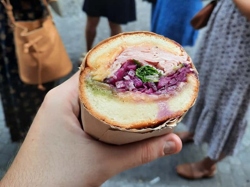 Paris: Le Marais Guided Food Tour with Tastings - Entering Le Marais through food, not just photos