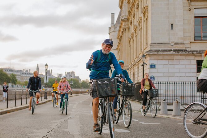 Paris Local Districts and Stories Off the Beaten Track Guided Bike Tour - Hôtel de Ville to the Marais: Walls, Parks, and the Feel of an Older Paris