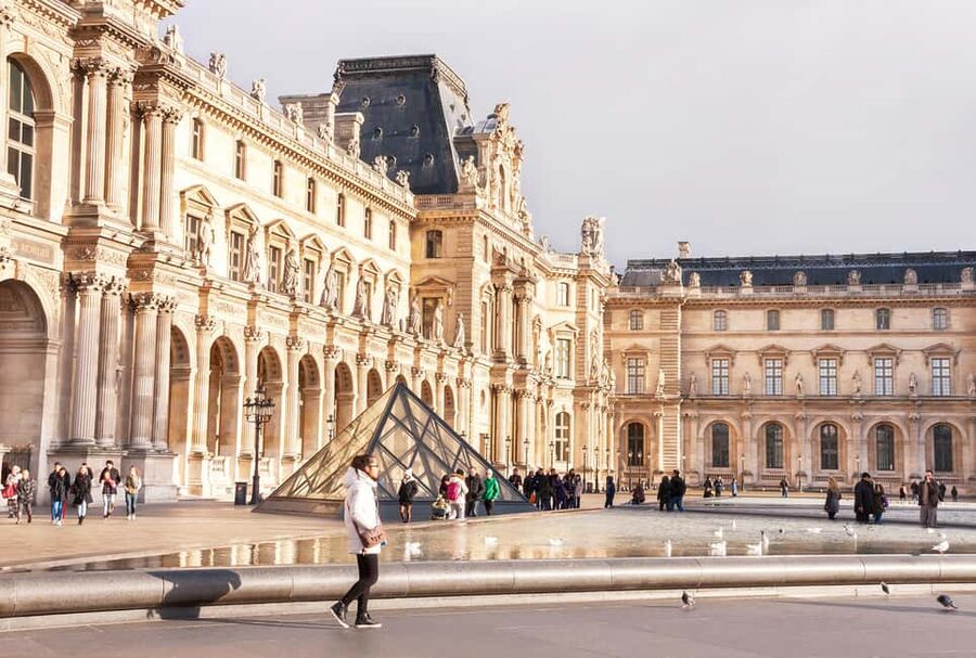 Paris: Louvre Museum Entry Ticket and Garden Walking Tour - Louvre Pyramid and the Arc de Triomphe du Carrousel, built for photos and context