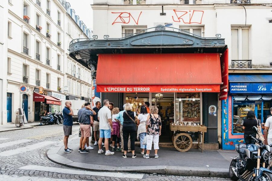 Paris: Montmartre Food and Wine Guided Tour - Savory surprises: amuse-galettes and brut cider energy