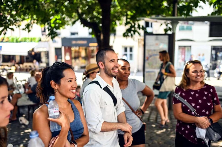 Paris: Montmartre Food Tasting Walking Tour with Secret Dish - The Butcher Stop: Cured Sausages and Hams You Can Taste