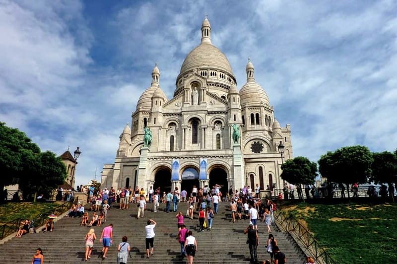 Paris: Montmartre Hidden Gems and Highlights Walking Tour - Sacré-Cœur hilltop views and 19th-century architecture tips