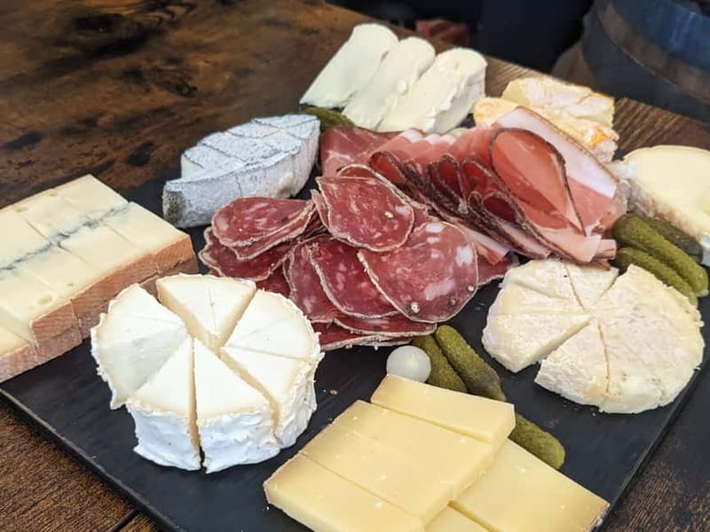Paris: Montmartre/Pigalle Foodie Tour with Tastings - Savory begins: charcuterie, cheeses, and Parisian comfort in motion