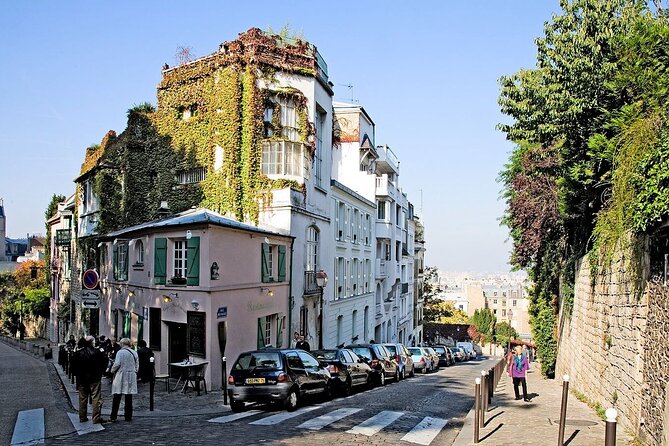 Paris Montmartre Private Walking Tour - Best Art, Culture, Food - Dalida’s bronze bust and the quieter square moments