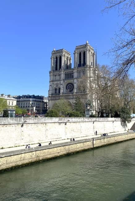 Paris: Notre-Dame Cathedral Exterior Guided Tour - The 2019 fire and the restored roof and spire