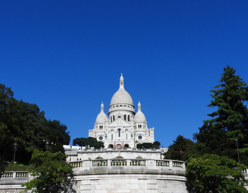 Paris: Sacré-Coeur and Montmartre Tour with Expert Guide - What you see around Sacré-Cœur: mosaics, symbolism, and the facade story
